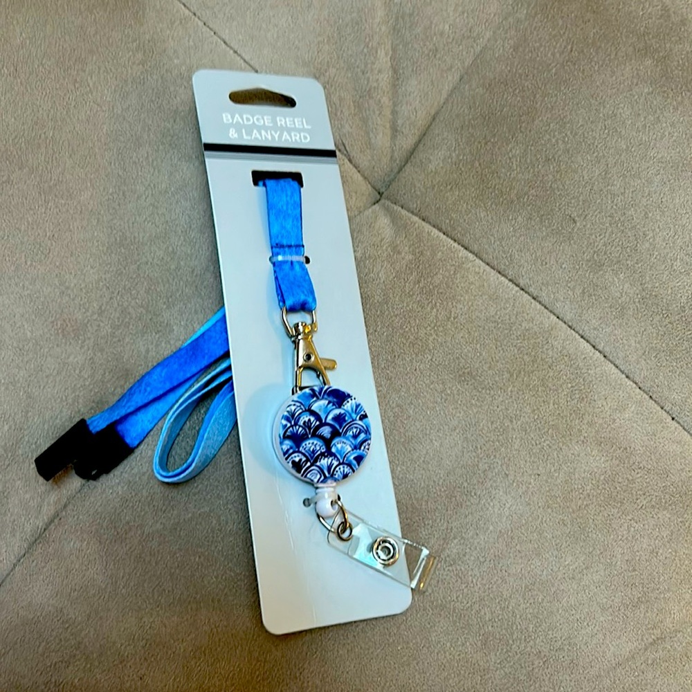 Badge reel and lanyard